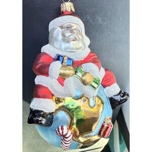 Poland Santa Sitting on top of the World Glass Christmas Ornament